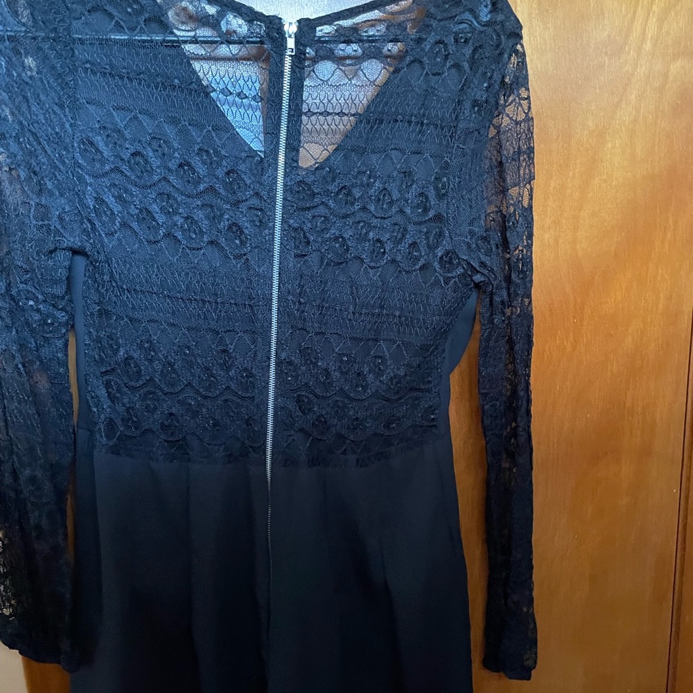 Romper black size large brand new